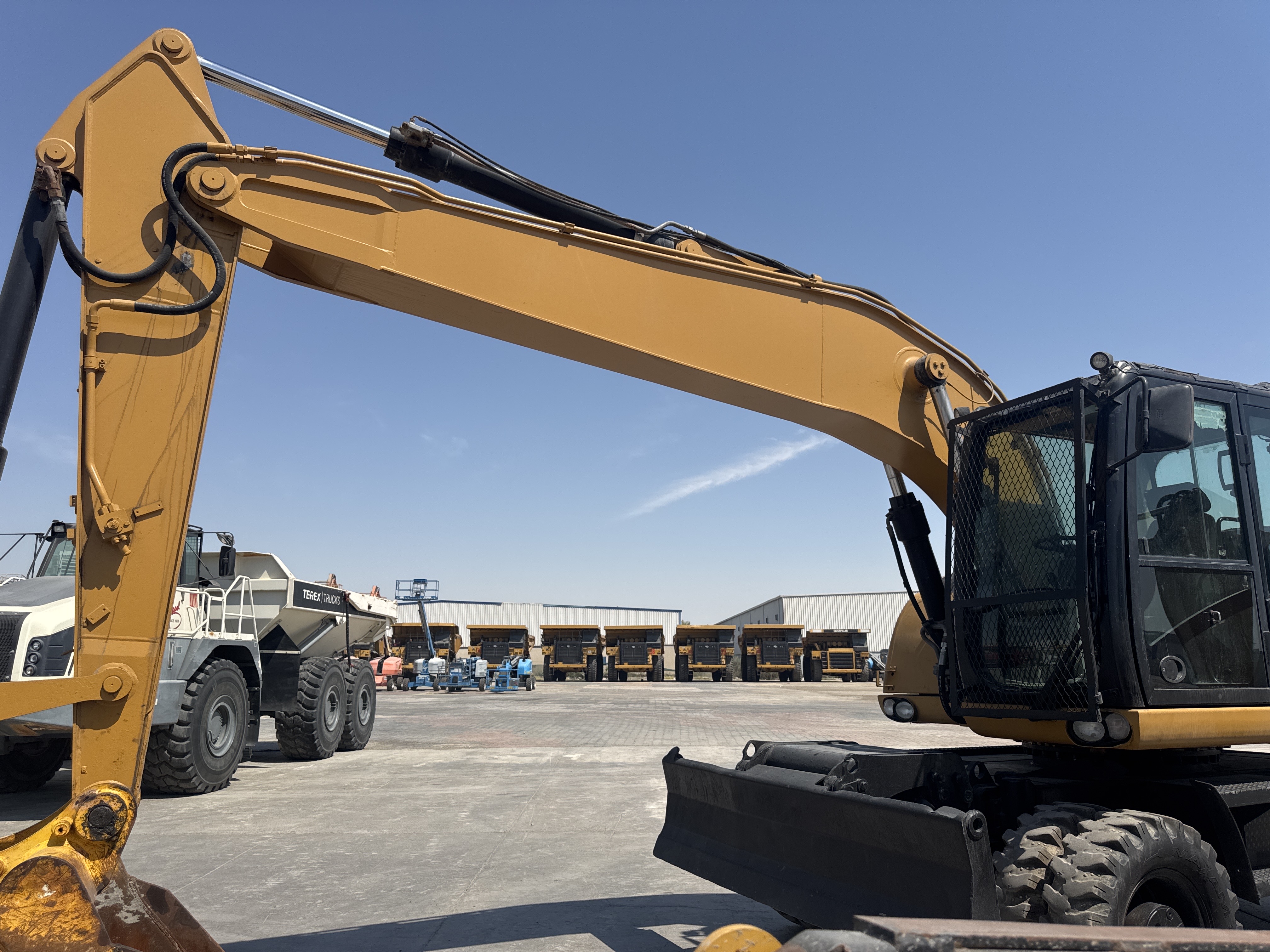 WLX-003-كاتربيلر-M318D-حفارات-ذات-عجلات-فحص-الهيكل-الصبغ-1