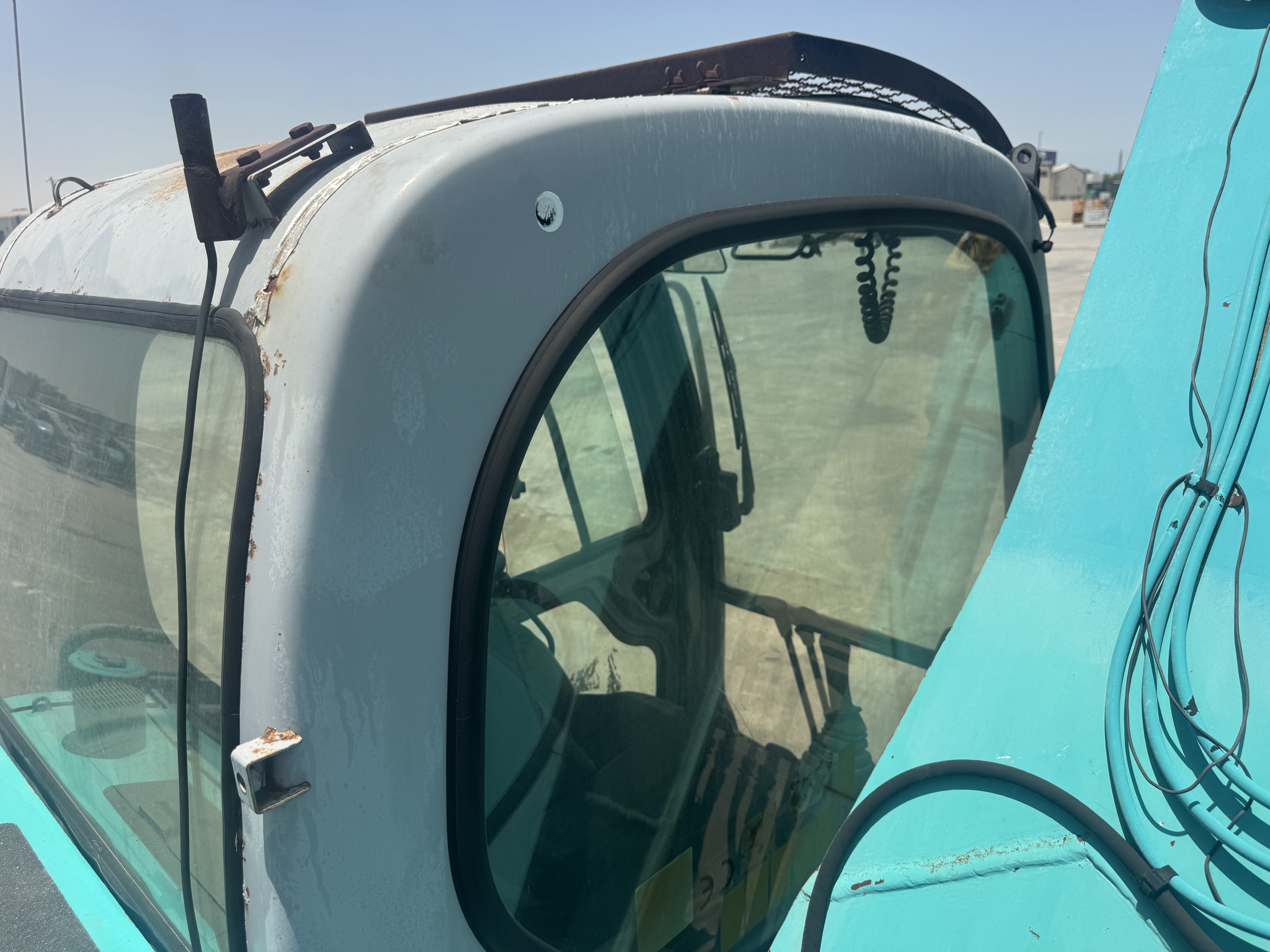 MDX-027-كوبلكو-SK200SR-حفارات-متوسطة-فحص-الأمان-الزجاج-1