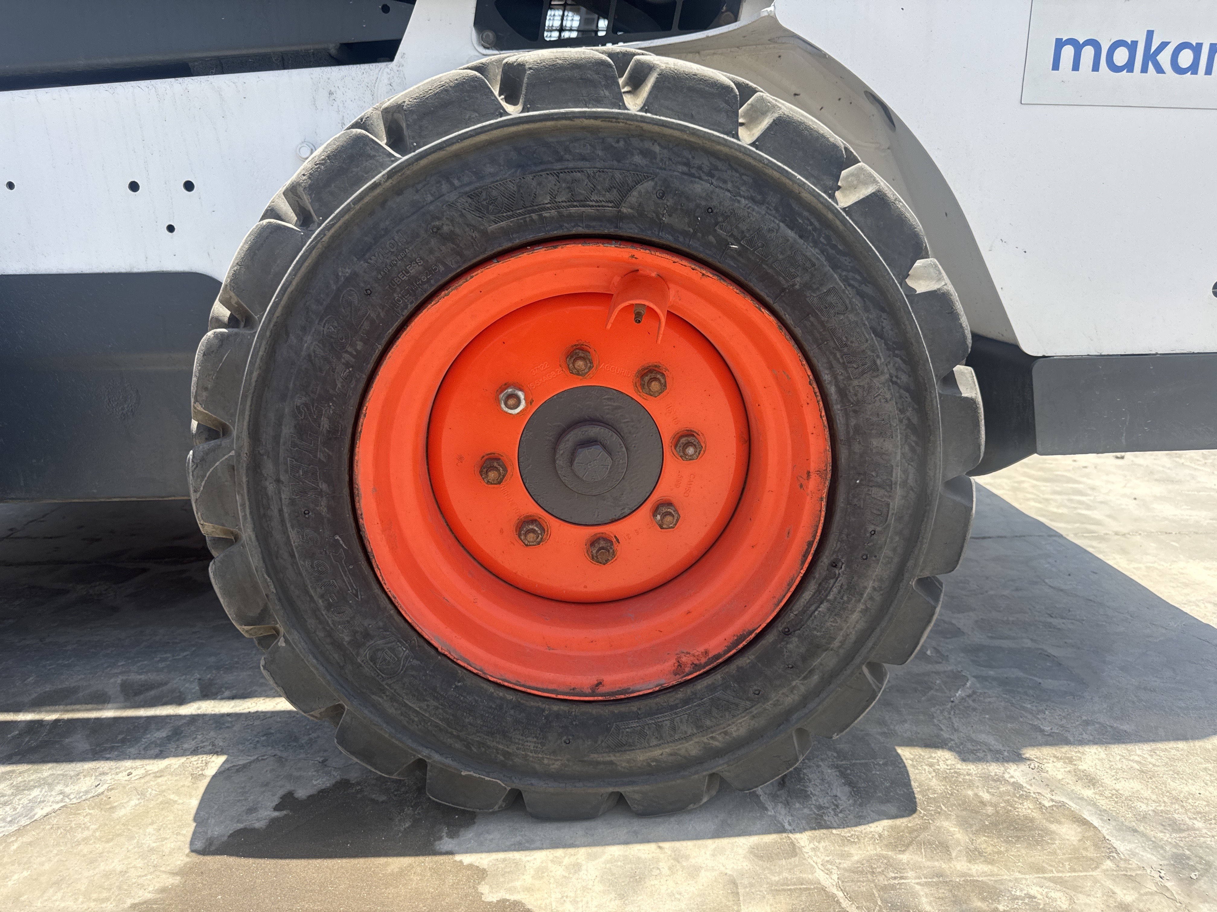 SSL-021-Bobcat-S510-Skid-steer-loaders-inspection-Chassis-Left-rear-tire-/-wheel-hub---condition-1