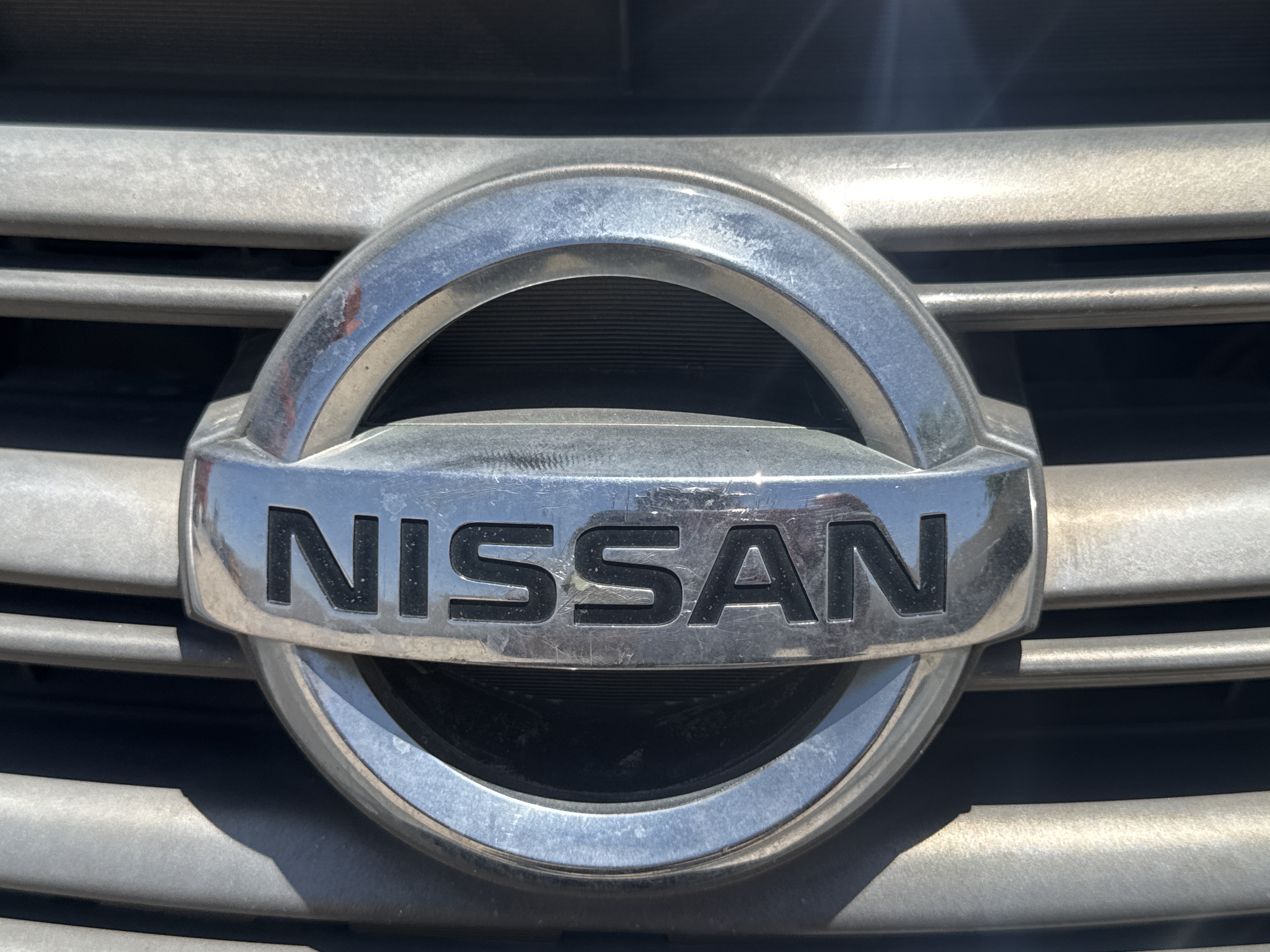 SEV-001-Nissan-Sentra-Sedans-inspection-Exterior-Front-logo-1