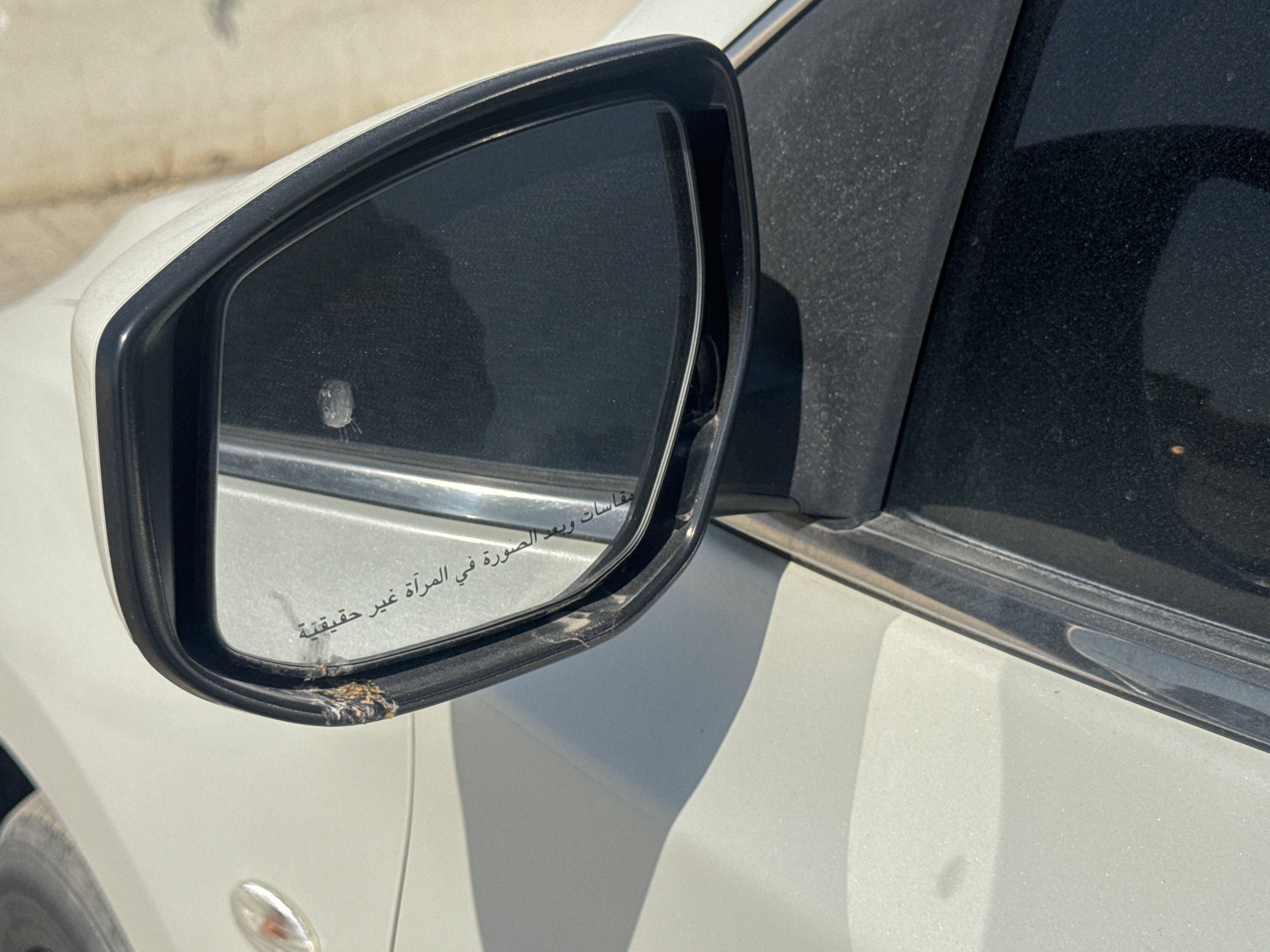 SEV-002-Nissan-Sentra-Sedans-inspection-Exterior-Left-side-mirror-2