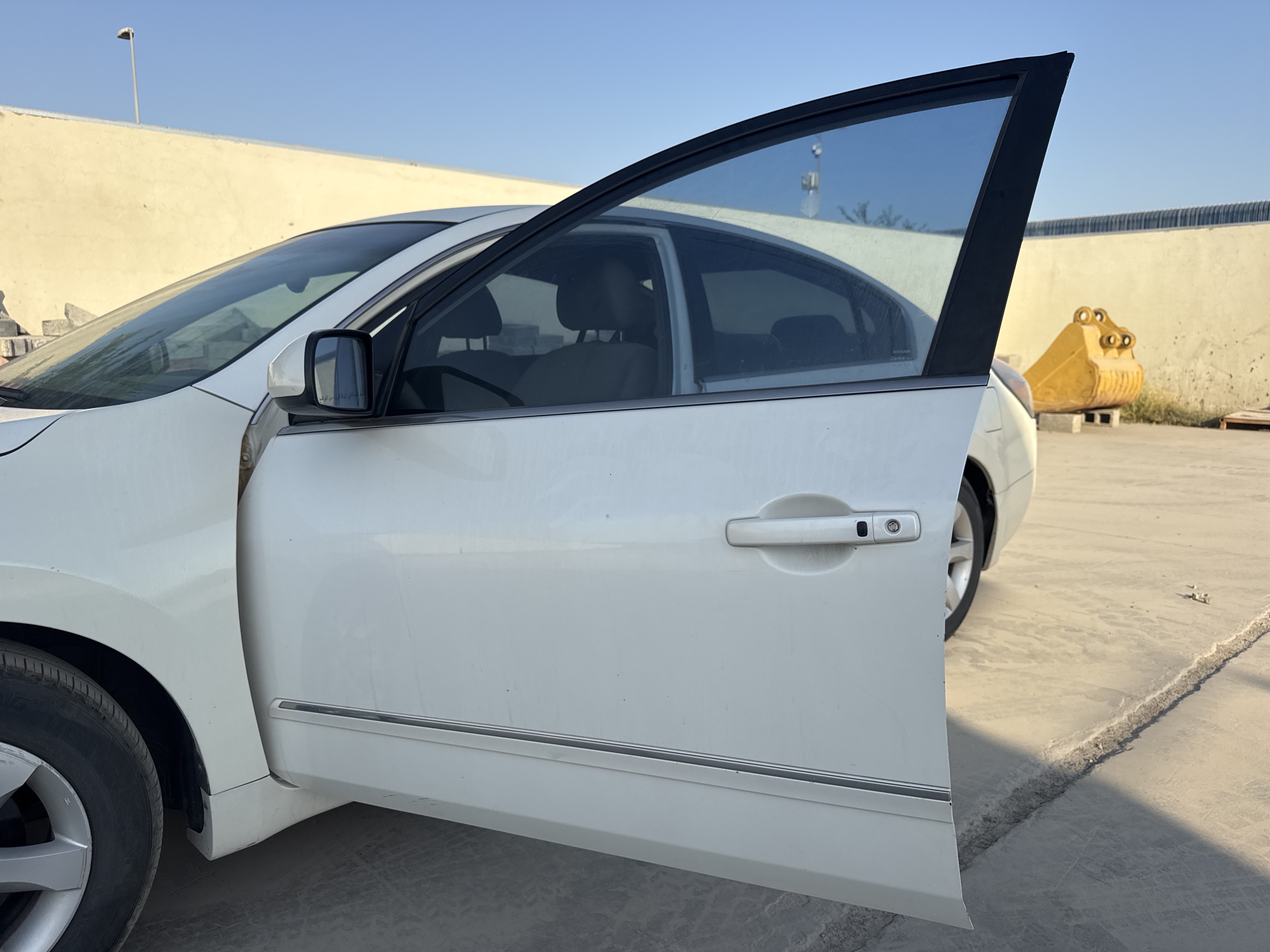 SEV-004-نيسان-Altima-سيارات-فحص-المظهر-الخارجي-الباب-الأمامي-الأيسر-1