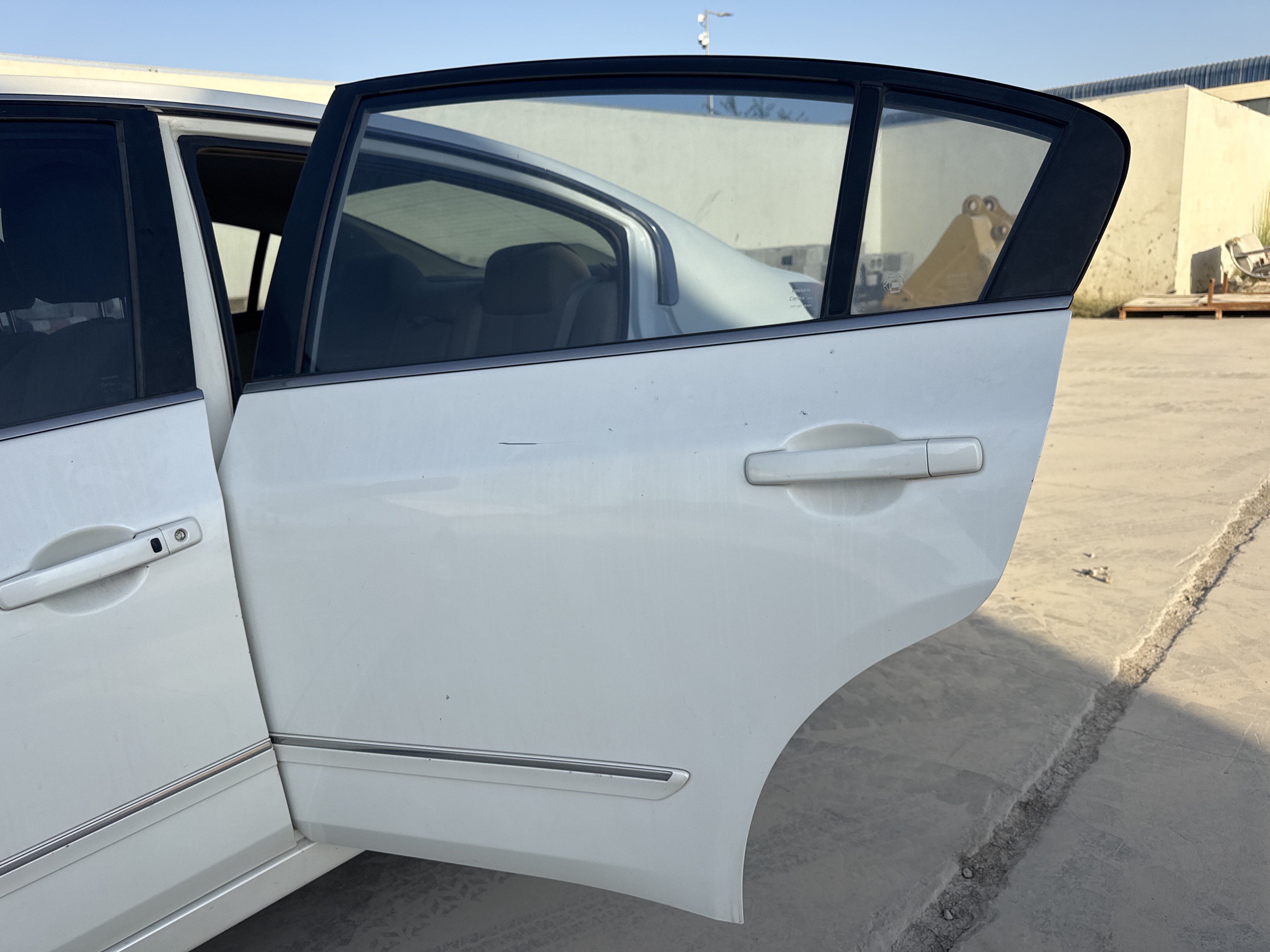 SEV-004-نيسان-Altima-سيارات-فحص-المظهر-الخارجي-الباب-الخلفي-الأيسر-1
