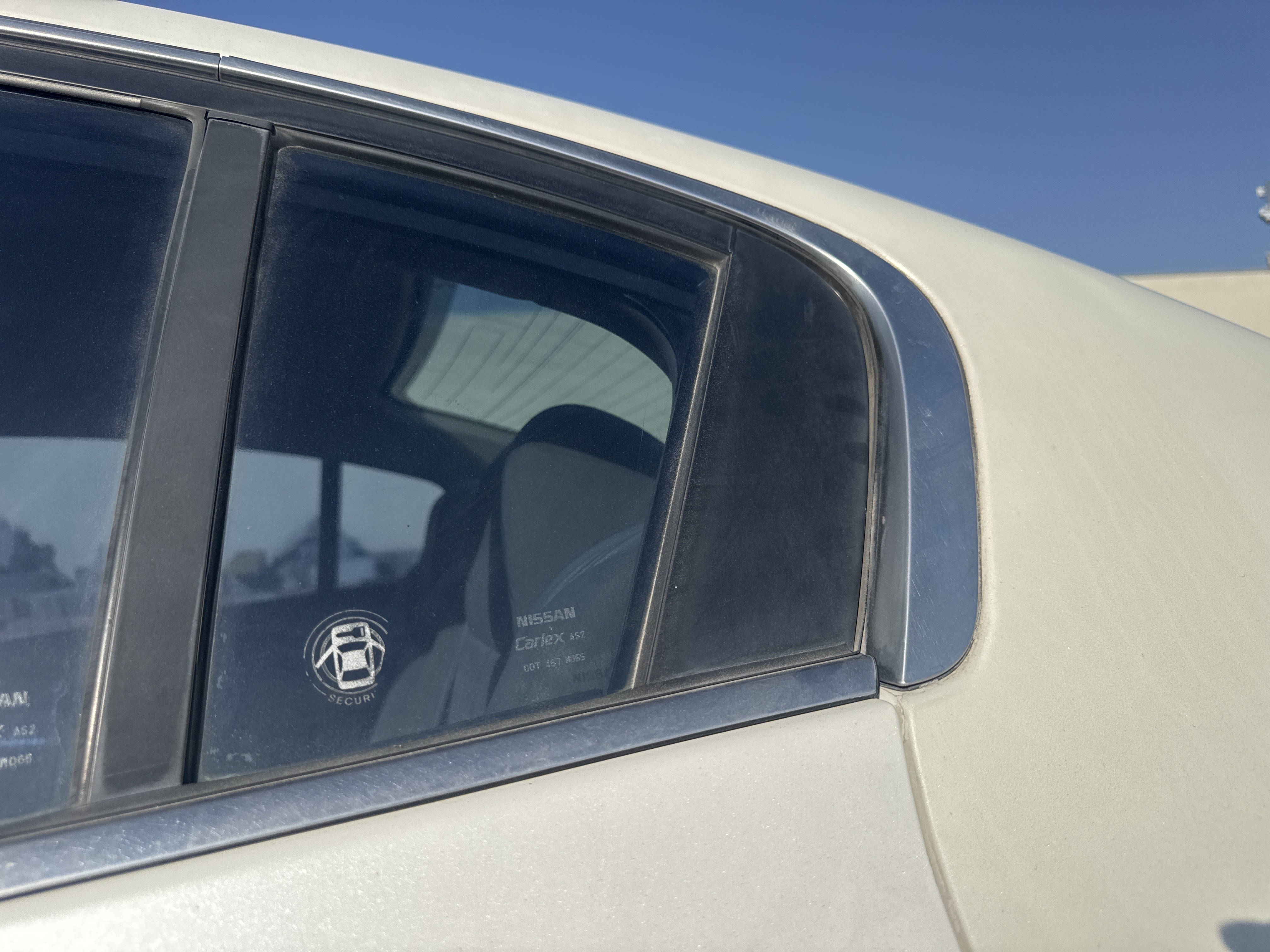 SEV-004-نيسان-Altima-سيارات-فحص-المظهر-الخارجي-زجاج-الرفرف-الخلفي-الأيسر-1