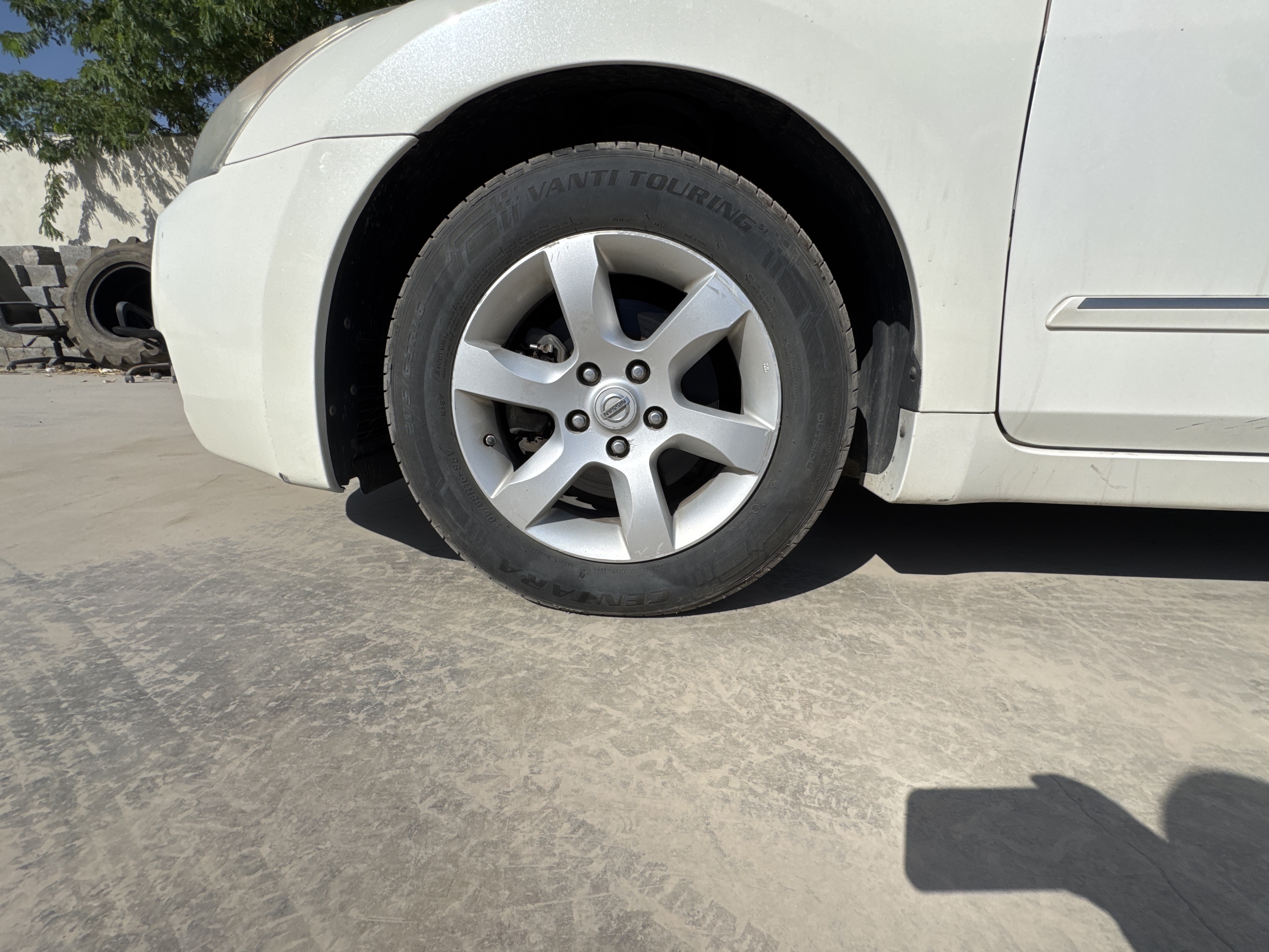 SEV-004-نيسان-Altima-سيارات-فحص-الهيكل-الجنط-الأمامي-الأيسر-/-الرنج-1