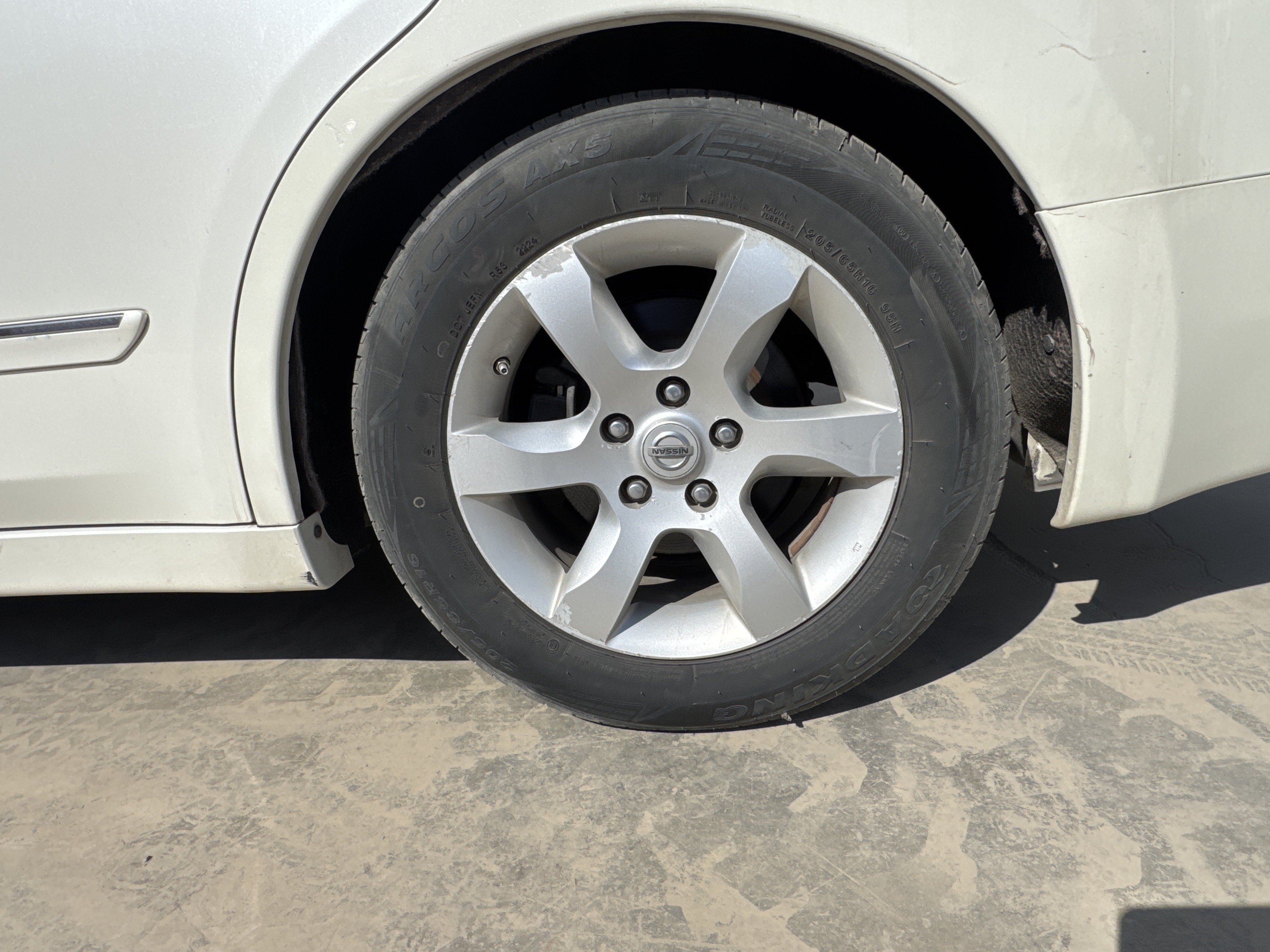 SEV-004-نيسان-Altima-سيارات-فحص-الهيكل-الجنط-الخلفي-الأيسر-/-الرنج-1