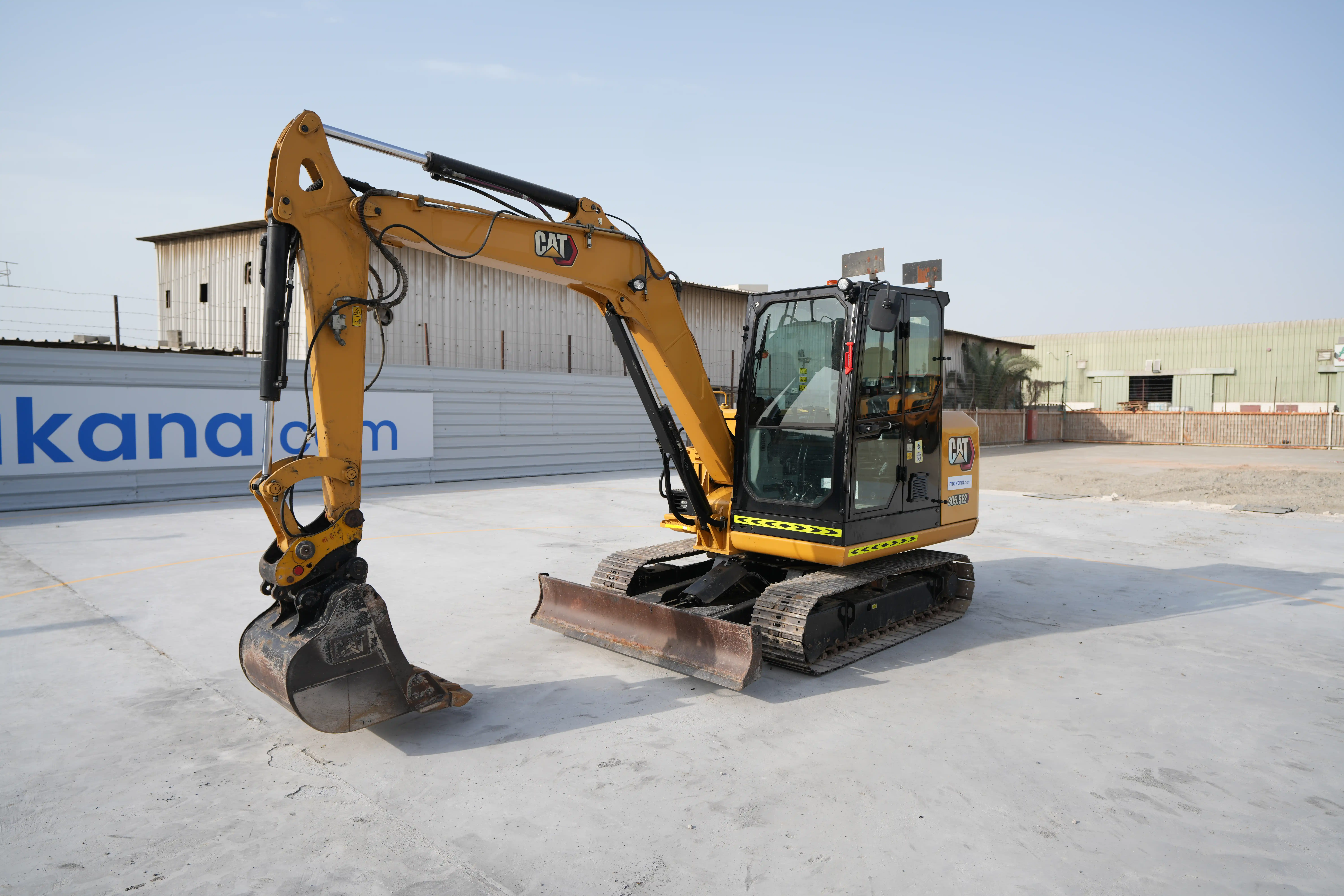 MNX-003-Cat-305.5E2-mini-excavator-exterior-front-left-side-view