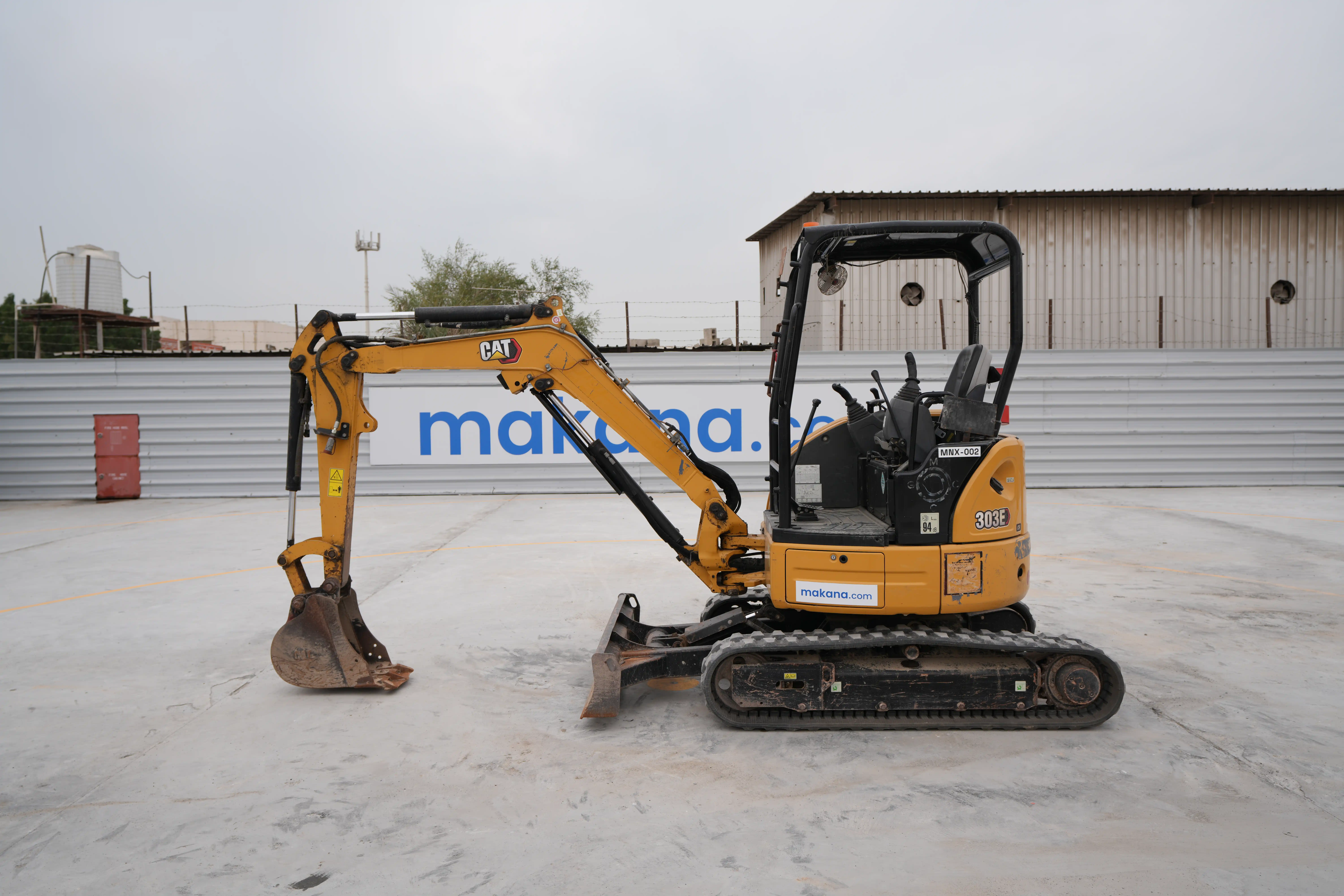 MNX-002-Cat-303E-mini-excavator-exterior-left-side-view