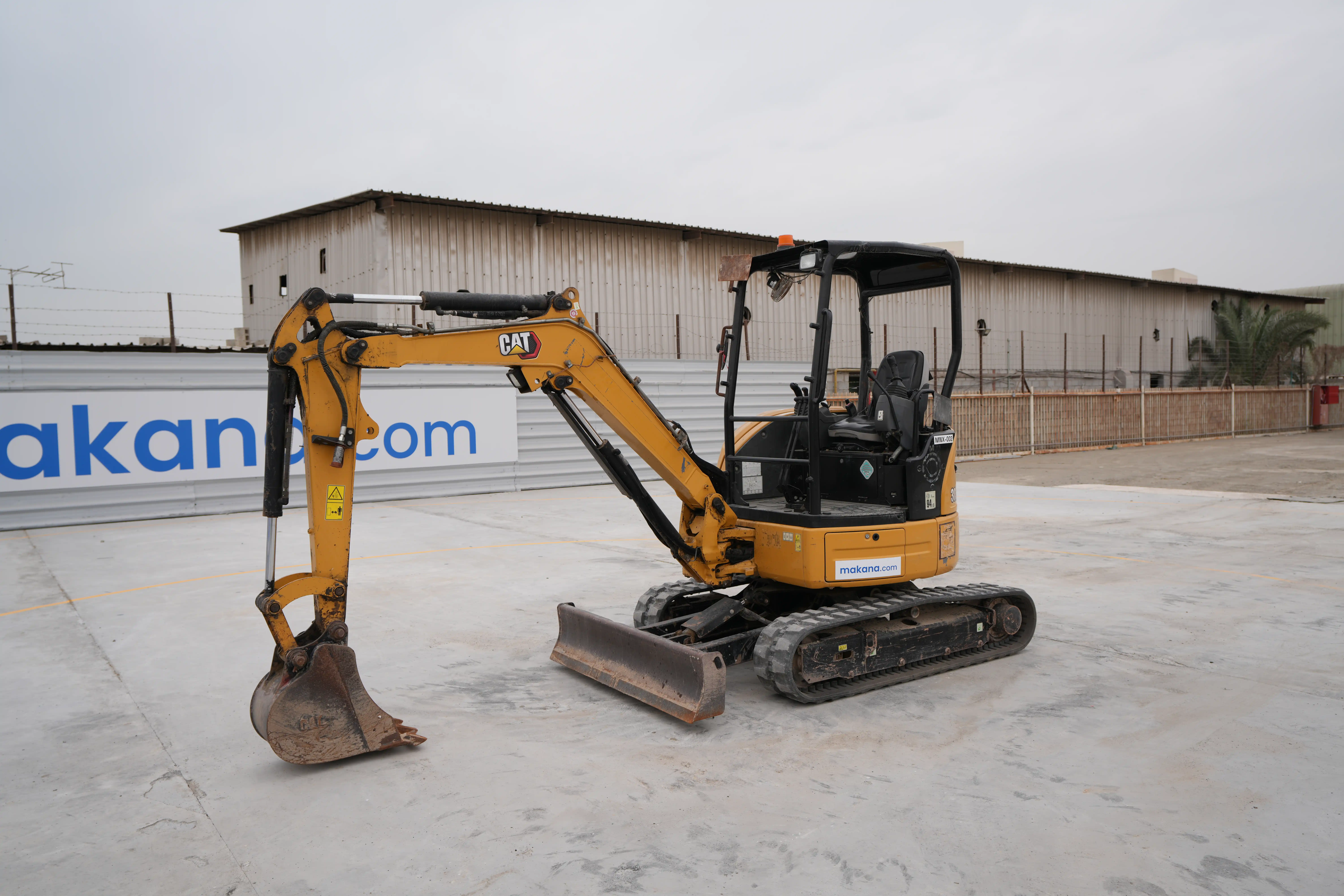 MNX-002-Cat-303E-mini-excavator-exterior-front-left-side-view