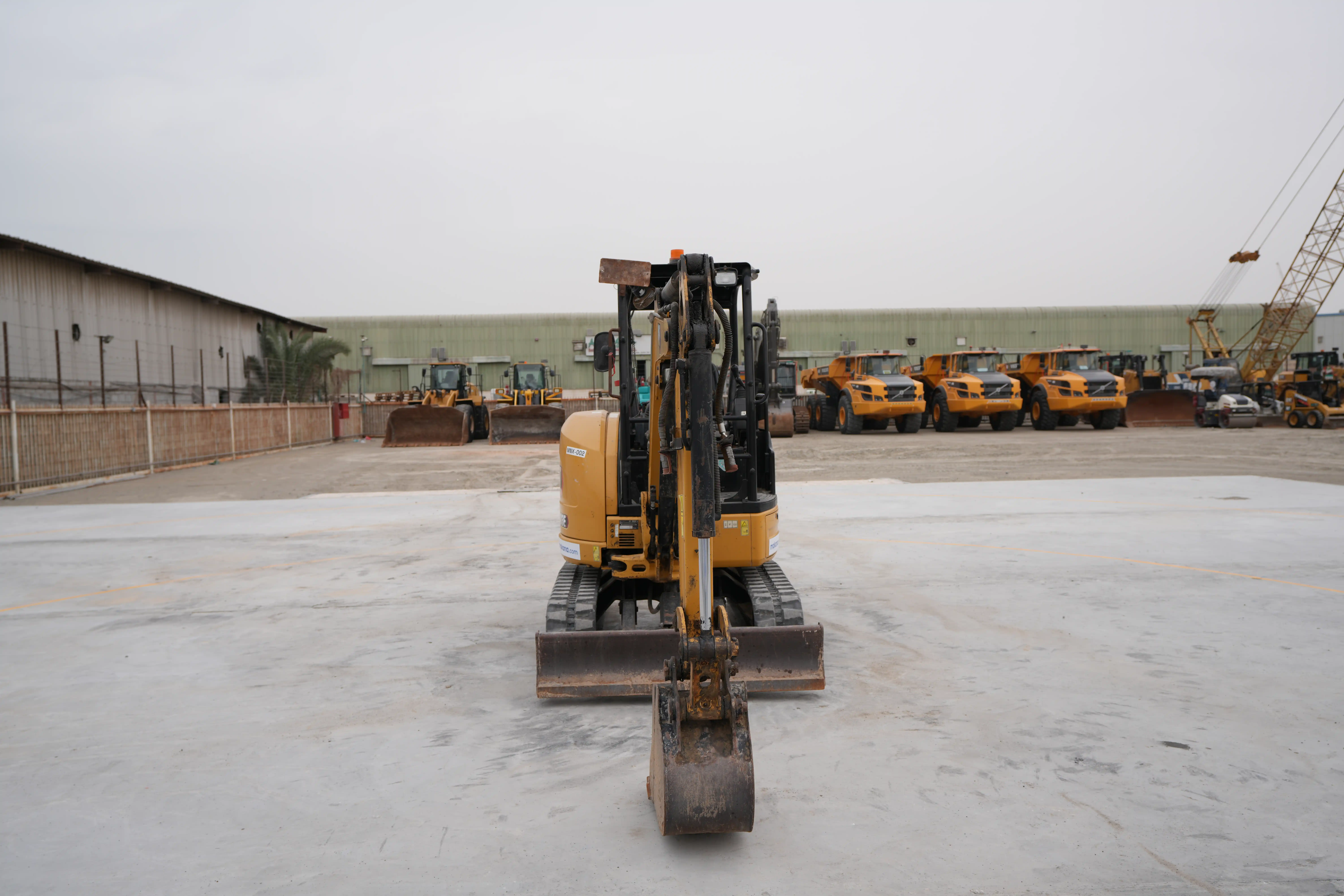 MNX-002-Cat-303E-mini-excavator-exterior-front-view