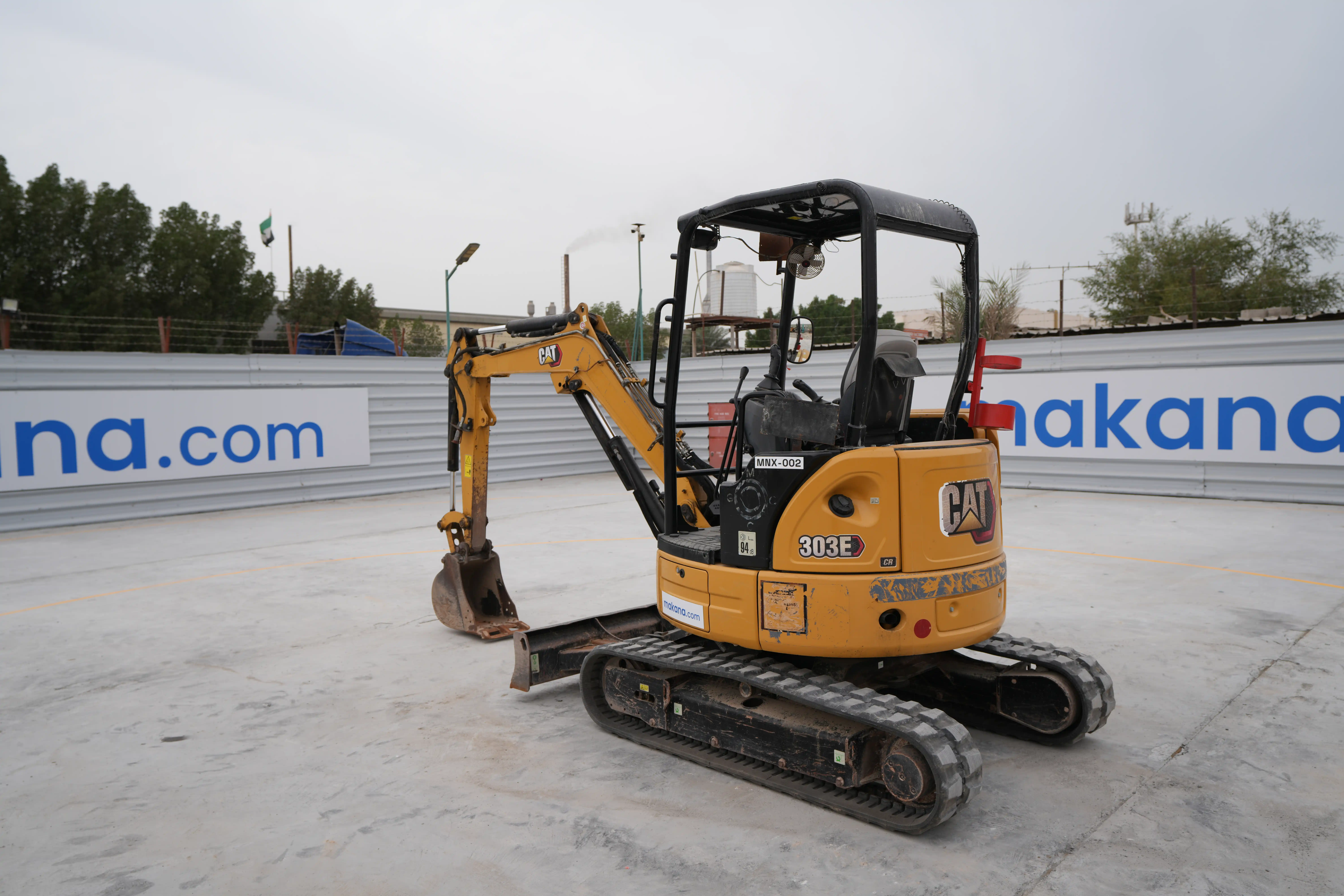 MNX-002-Cat-303E-mini-excavator-exterior-rear-left-side-view