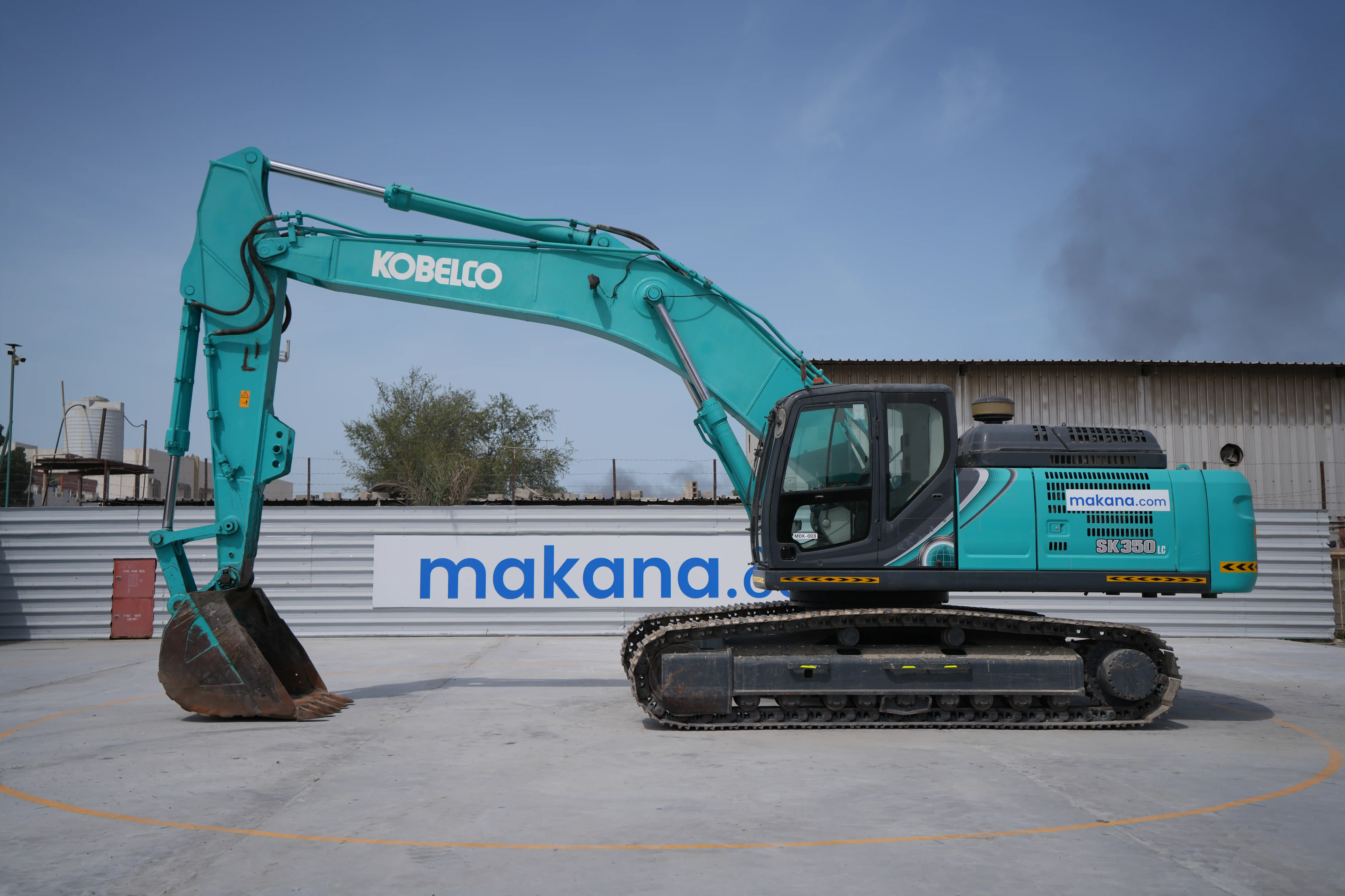 MDX-003-Kobelco-SK350LC-10-medium-excavator-exterior-left-side-view
