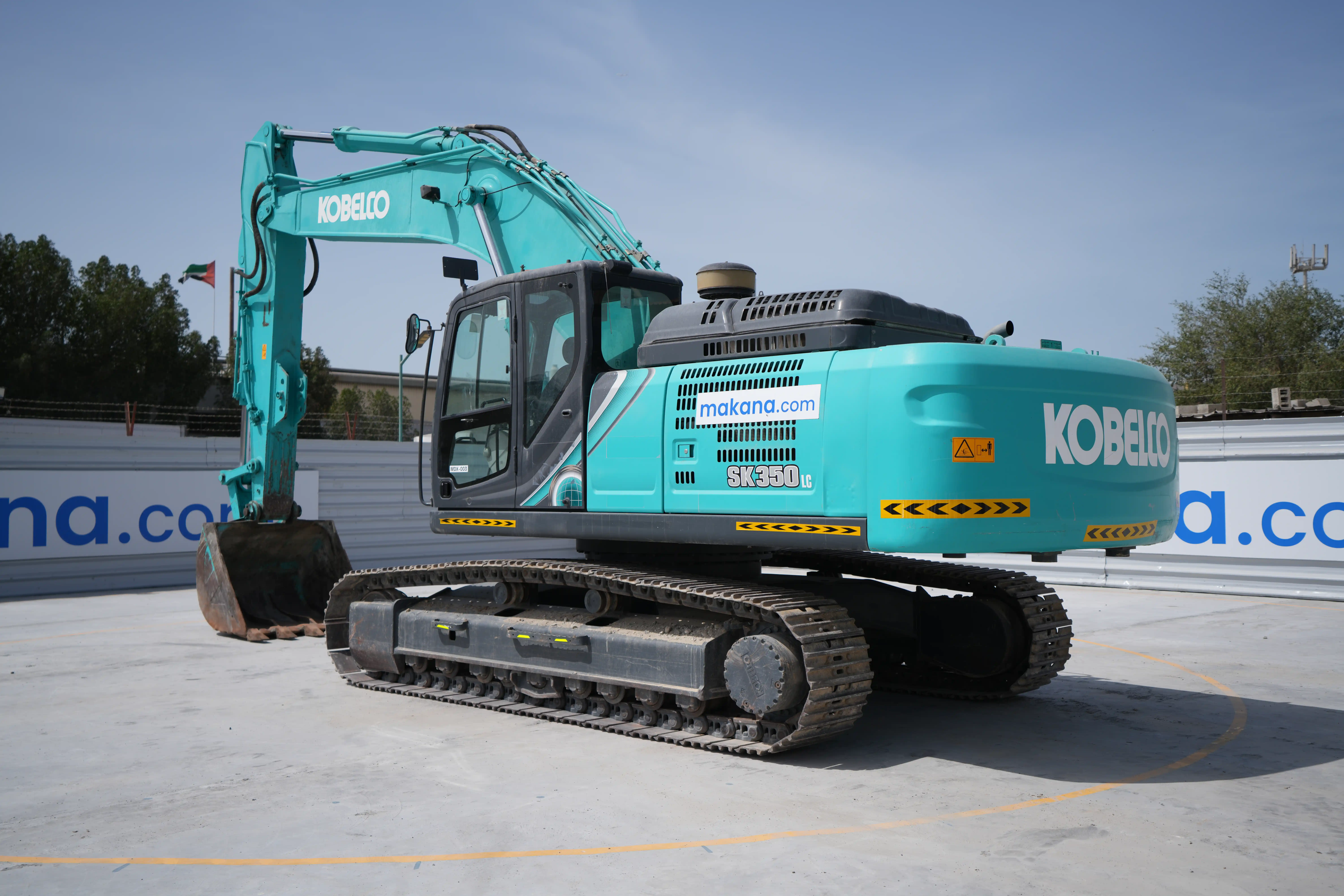 MDX-003-Kobelco-SK350LC-10-medium-excavator-exterior-rear-left-side-view
