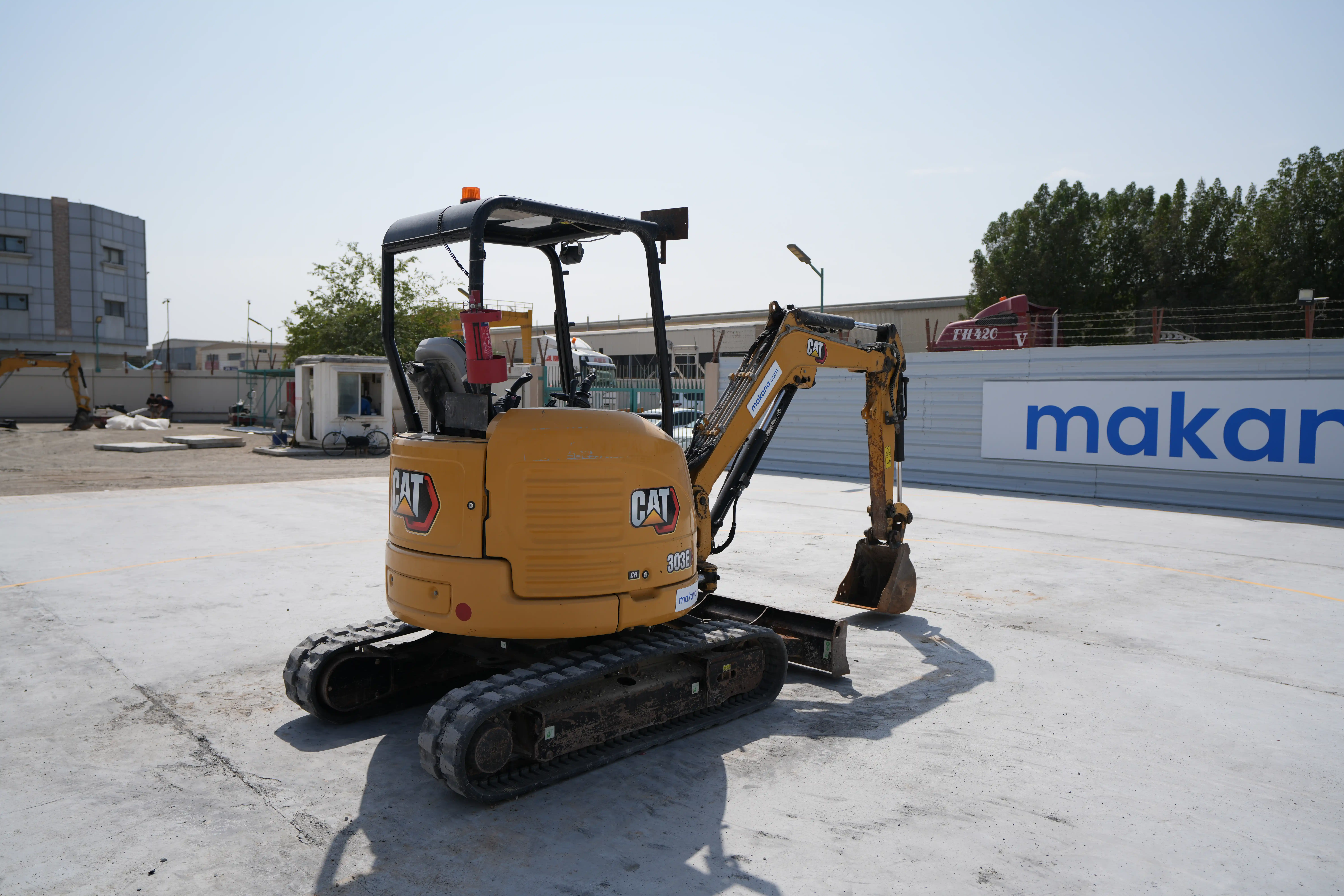 MNX-004-Cat-303E-mini-excavator-exterior-rear-right-side-view