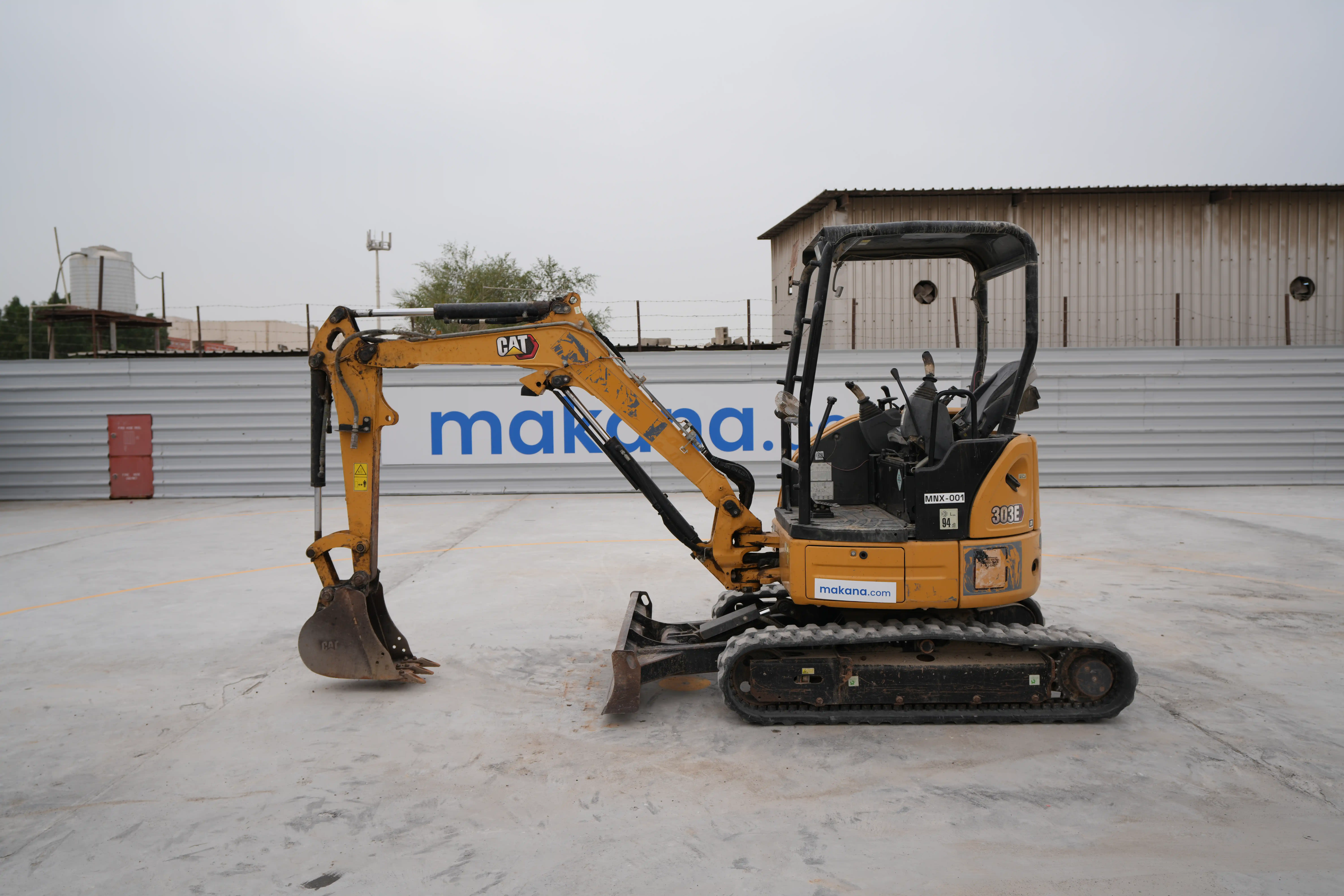 MNX-001-Cat-303E-mini-excavator-exterior-left-side-view