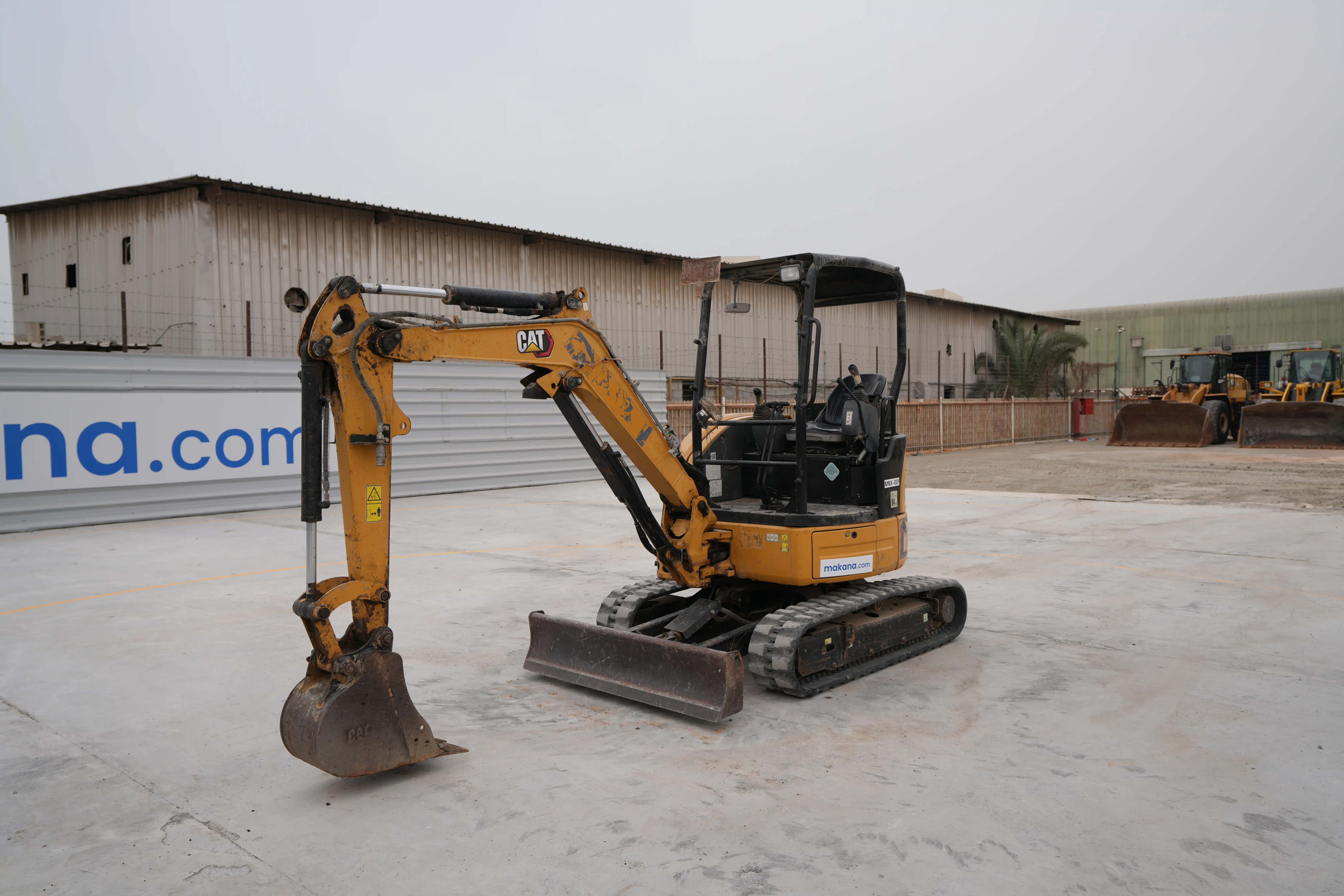 MNX-001-Cat-303E-mini-excavator-exterior-front-left-side-view