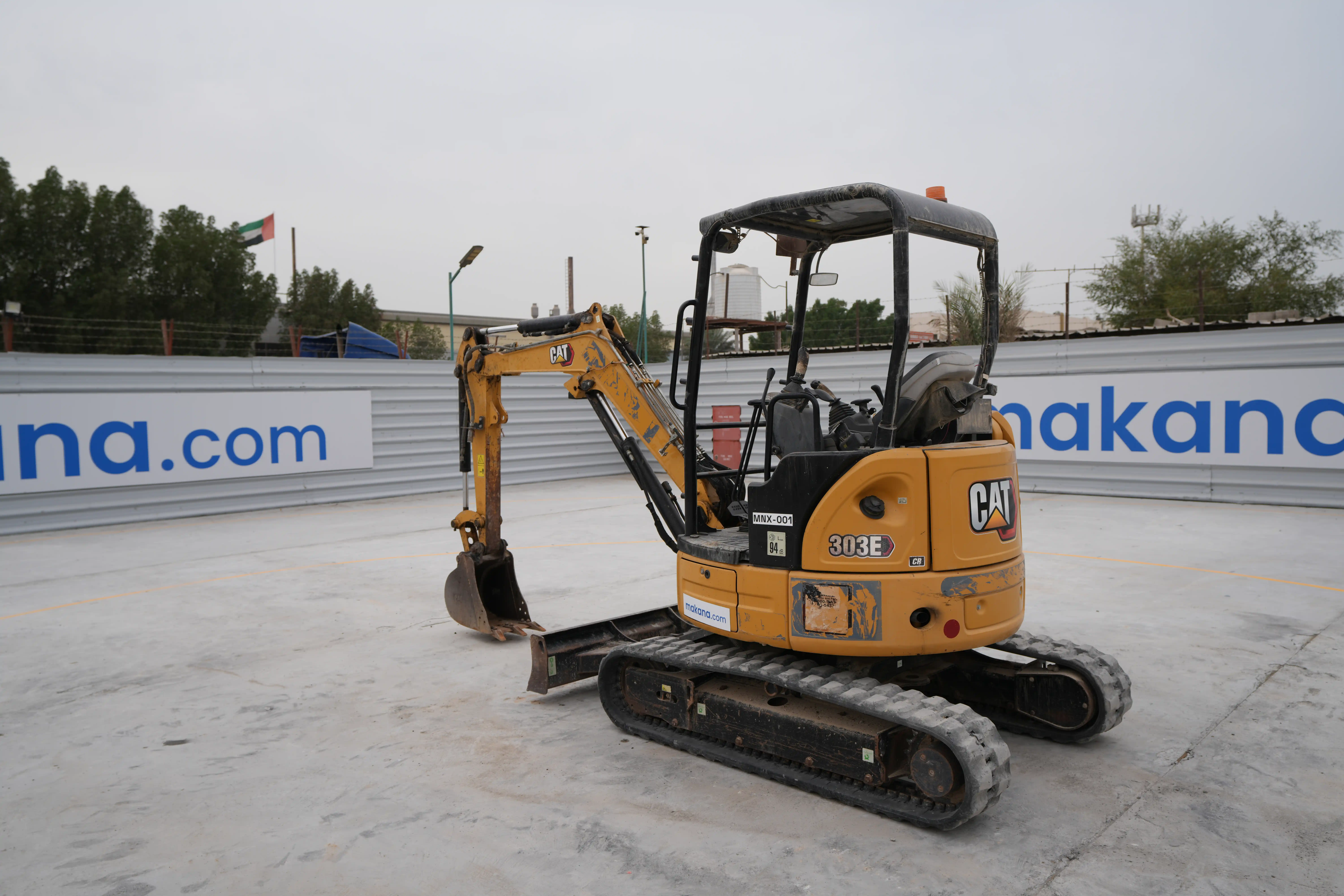 MNX-001-Cat-303E-mini-excavator-exterior-rear-left-side-view