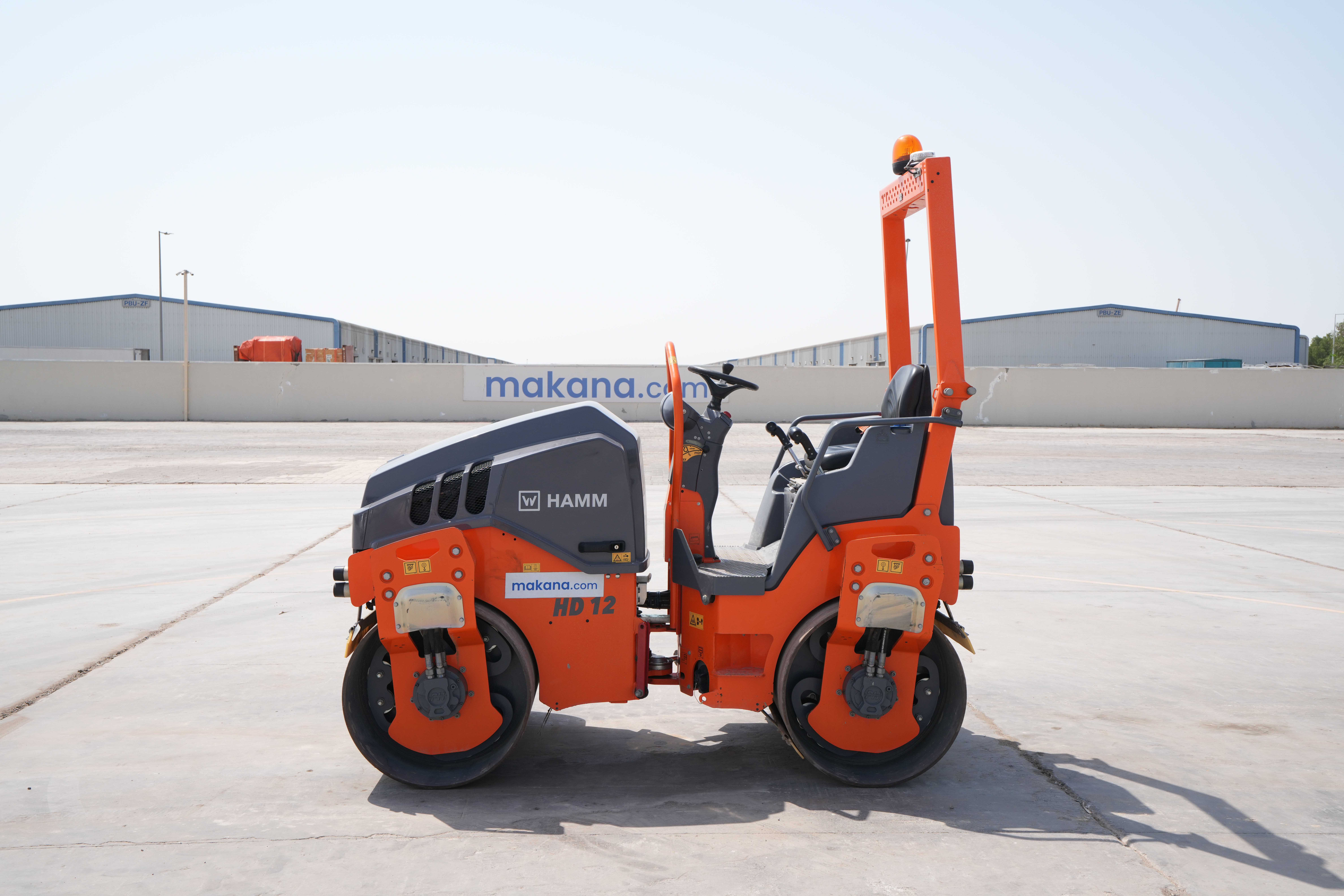SRC-002-Hamm-HD-12-VV-tandem-roller-exterior-left-side-view