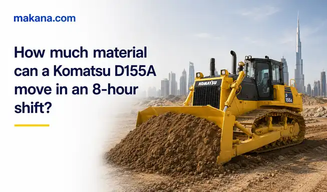 How much material can a Komatsu D155A move in an 8-hour shift?