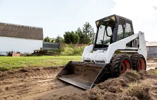 Skid steer vs. backhoe: the key differences and which loader is right for your project? - 2